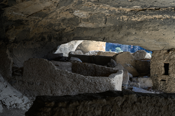 An archway above cliff dwellings